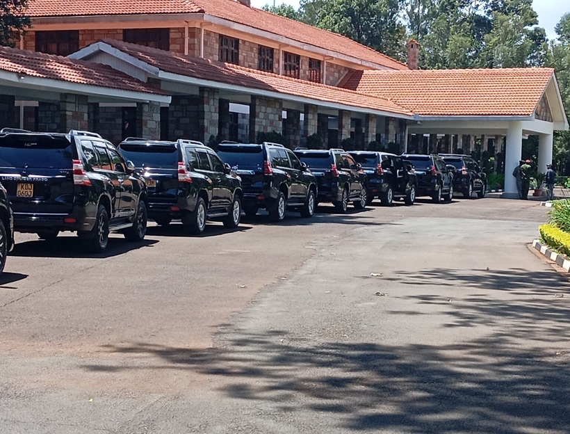 Lineup of black Prado SUVs